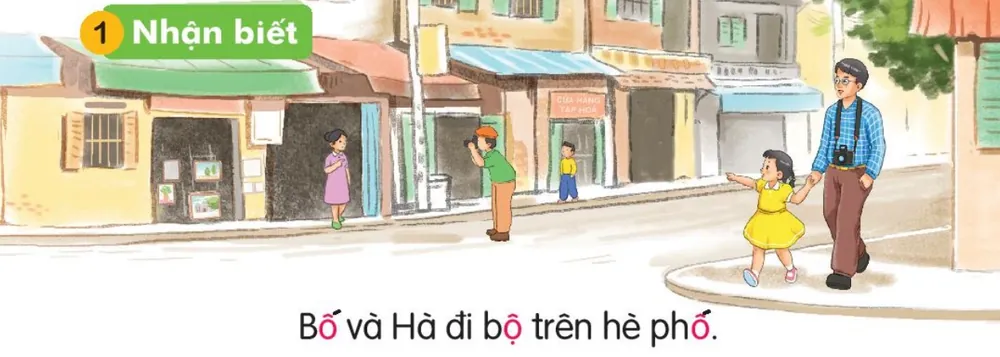 bố dắt Hà đi bộ trên vỉa hè phố.