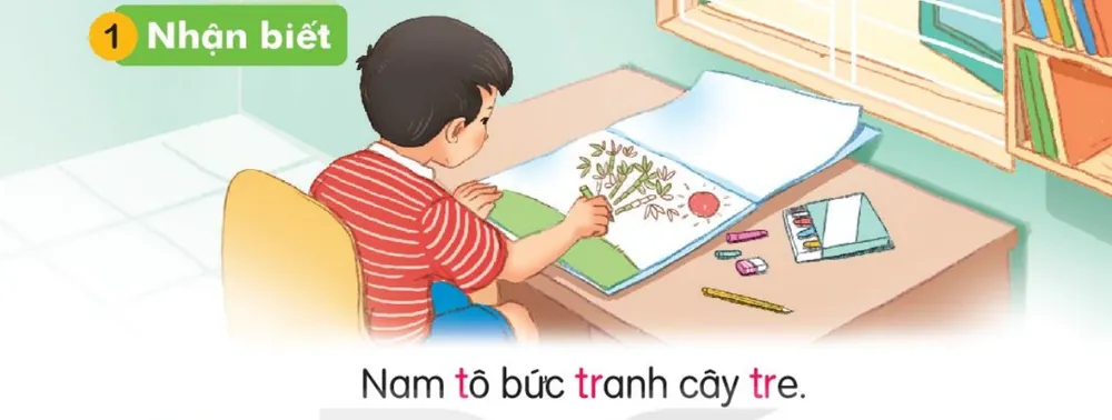Nam ngồi tô màu bức tranh cây tre. Câu dưới tranh: "Nam tô bức tranh cây tre."