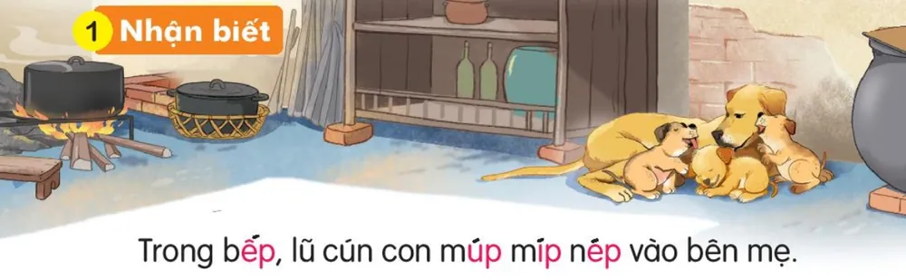 lũ cún con nằm nép bên chó mẹ trong gian bếp. Câu dưới tranh: "Trong bếp, lũ cún con múp míp nép vào bên mẹ."