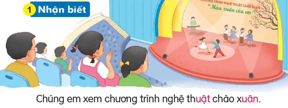 các bạn nhỏ ngồi xem biểu diễn trên sân khấu có dòng chữ "Chương trình nghệ thuật chào xuân – Mùa xuân của em". Câu dưới tranh: "Chúng em xem chương trình nghệ thuật chào xuân."